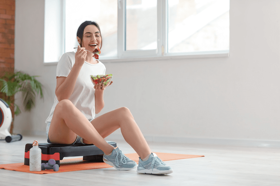 women eating salad