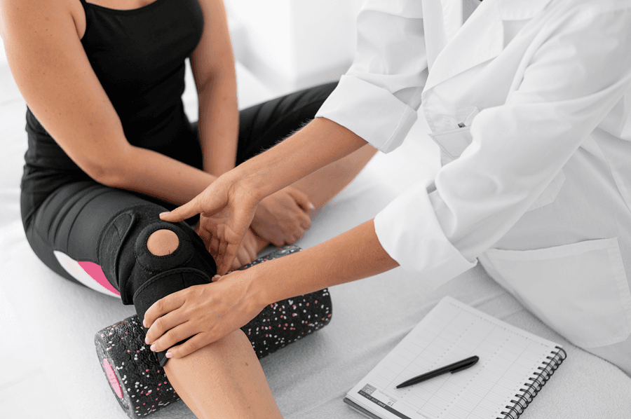 Physiotherapist Helping with Knee Pain