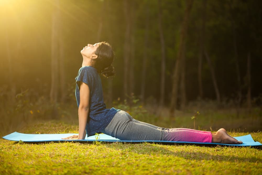 woman doing yoga for heart issues