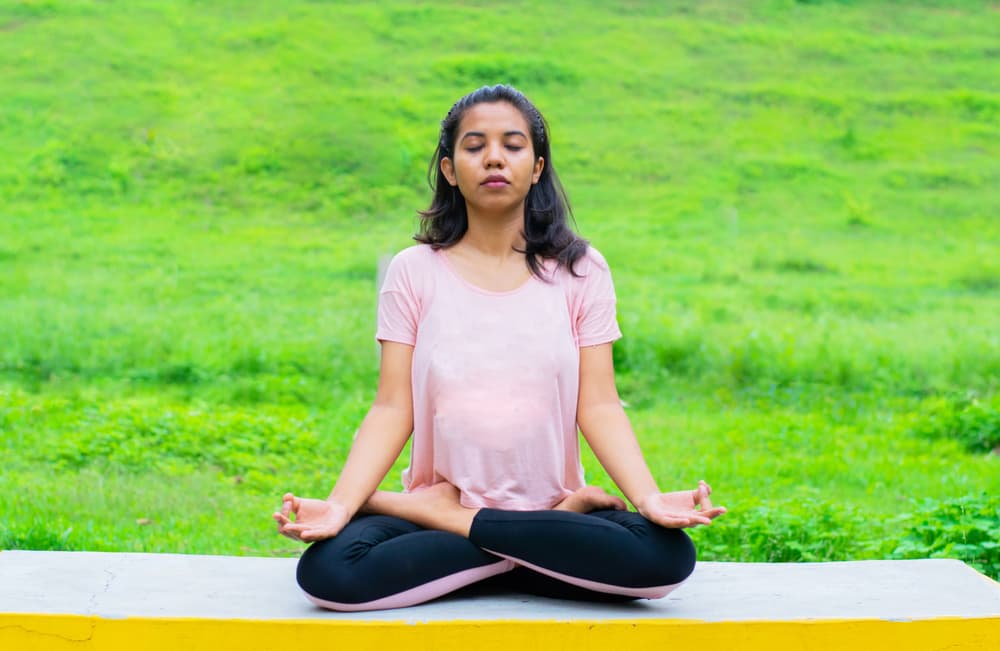 woman doing yoga to improve memory and focus