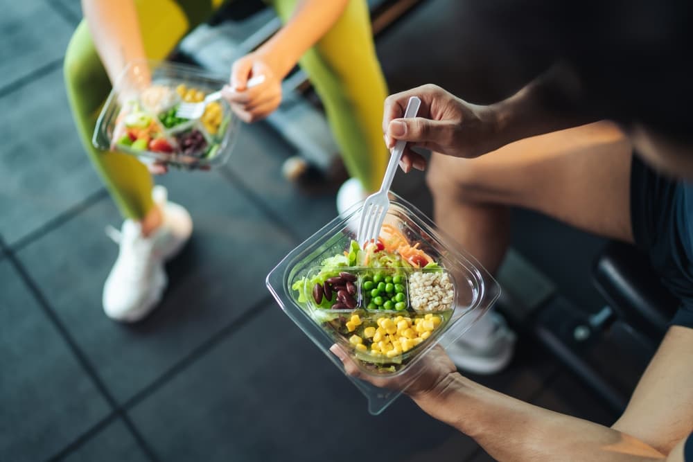 people eating protein rich food in gym