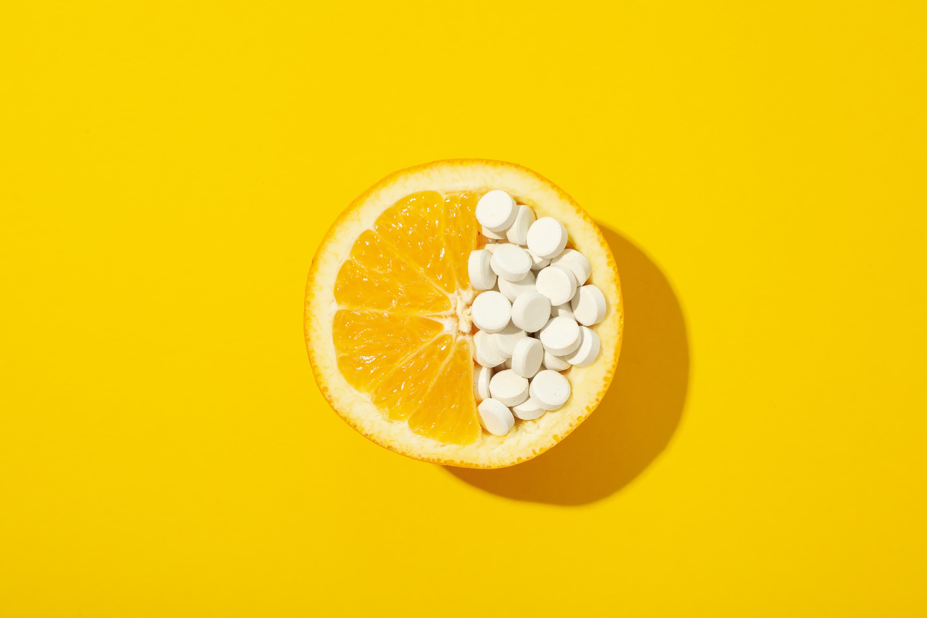 Orange with pills